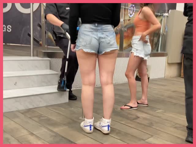 Blue Jean Shorts Duo Girl Friends In Mall